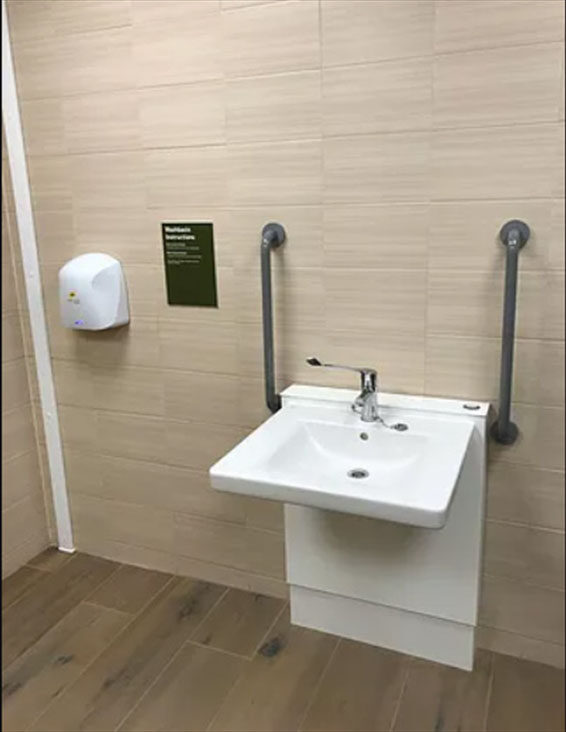 Accessible washbasin with grab rails, Center Parcs
