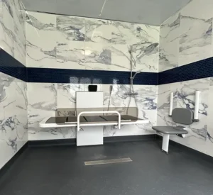 `Muhammad's wetroom with ROPOX shower changing bed and shower seat`